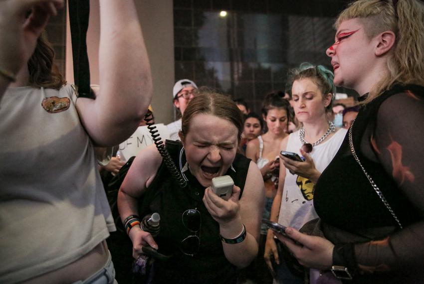 A demonstrator speaks passionately to protestors gathered in front of the Federal Courthouse following the Supreme Court ruling to overturn Roe v. Wade on Friday, June 24, 2022, in Houston, Texas.